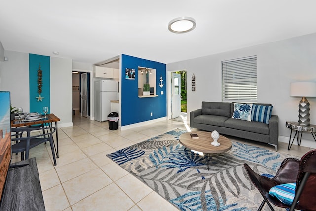 living room featuring light tile patterned flooring