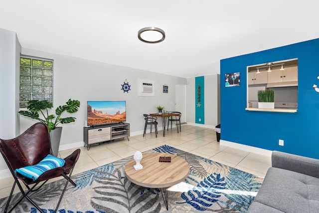 tiled living room featuring a wall mounted AC