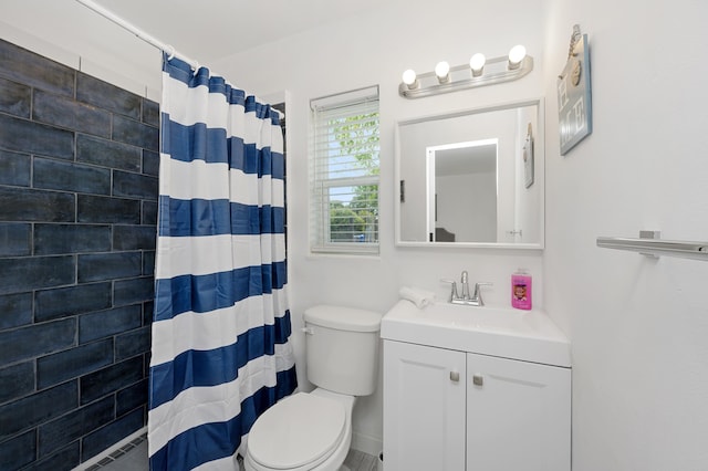 bathroom with vanity, a shower with shower curtain, a baseboard radiator, and toilet