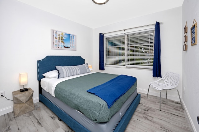 bedroom featuring hardwood / wood-style flooring