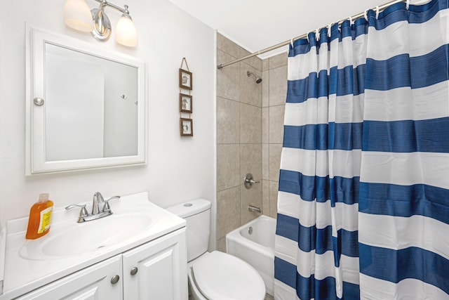 full bathroom with vanity, toilet, and shower / bath combo with shower curtain