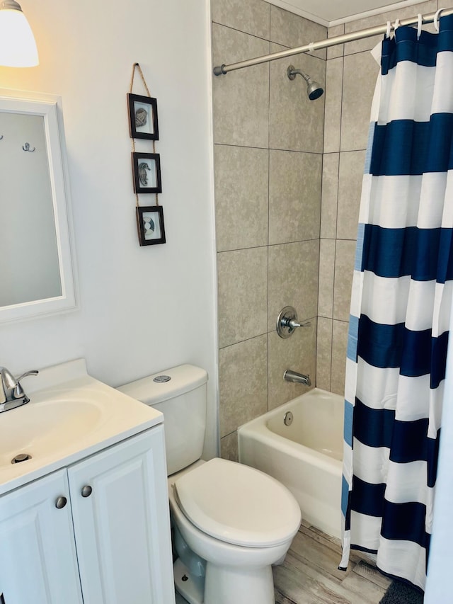 full bathroom featuring shower / tub combo, vanity, toilet, and wood-type flooring