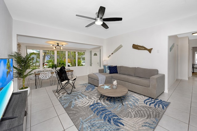 tiled living room with ceiling fan