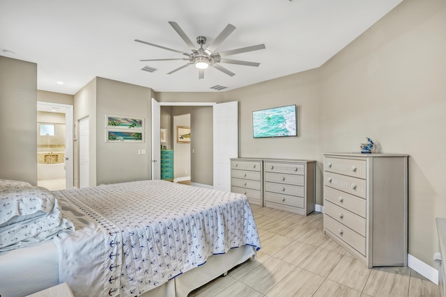 bedroom with ensuite bathroom and ceiling fan