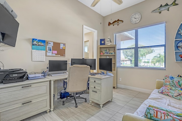 office area featuring ceiling fan and light tile patterned floors