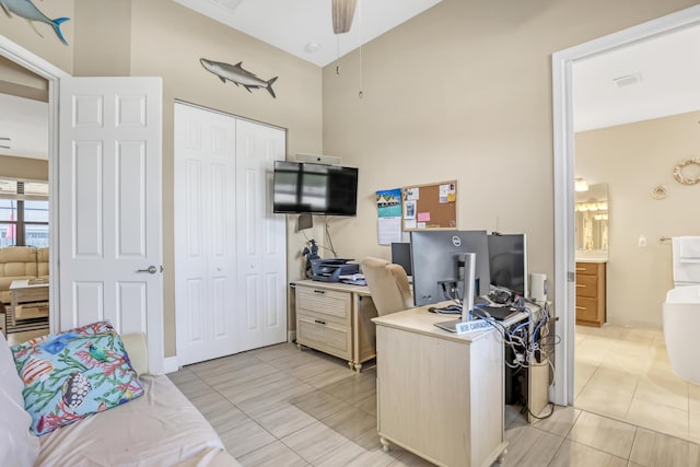 tiled home office with ceiling fan