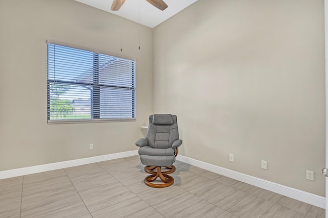 unfurnished room with light tile patterned flooring and ceiling fan