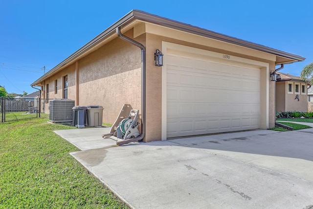 view of property exterior with cooling unit, a garage, and a lawn