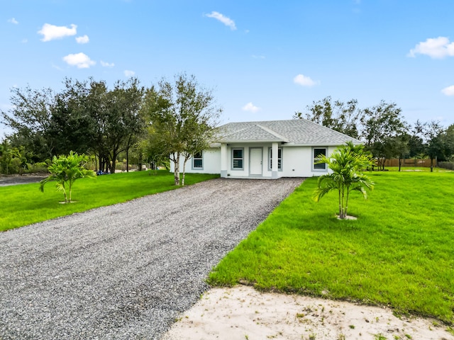 view of front of house with a front lawn