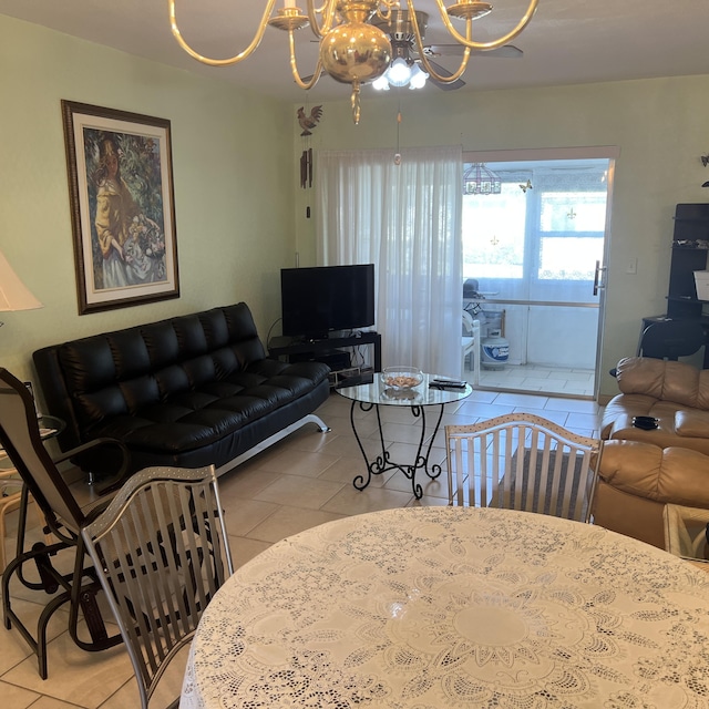 living room with light tile patterned flooring and a notable chandelier