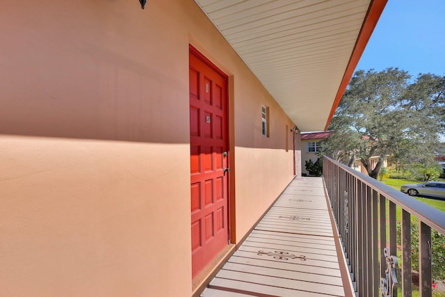 doorway to property featuring a balcony