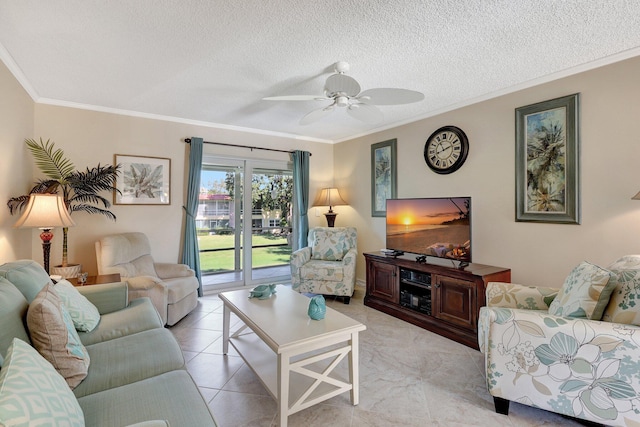 tiled living room featuring ceiling fan, ornamental molding, and a textured ceiling