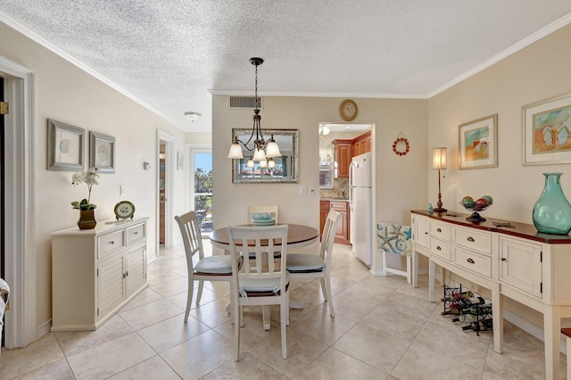 dining room with a notable chandelier, light tile patterned flooring, and ornamental molding