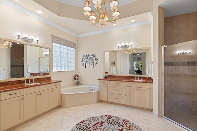 bathroom with independent shower and bath, crown molding, tile patterned floors, and vanity