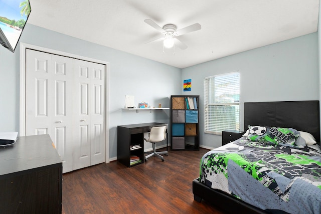 bedroom with ceiling fan, a closet, and dark hardwood / wood-style floors