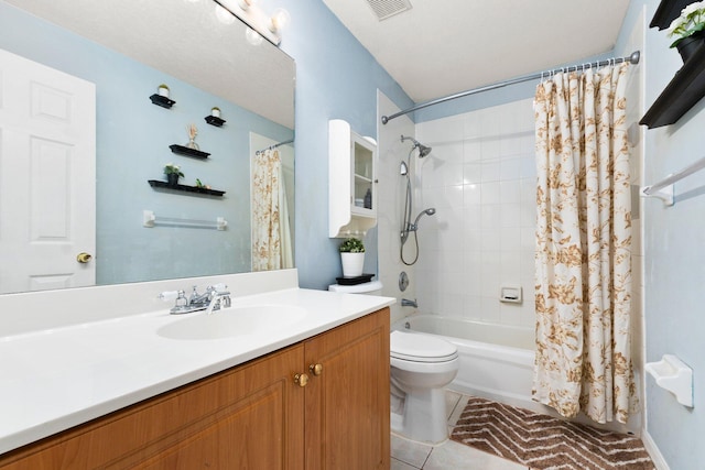 full bathroom with vanity, shower / tub combo, tile patterned flooring, and toilet