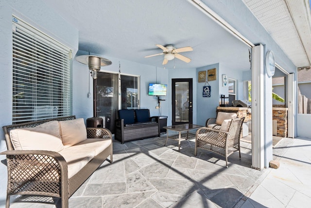 view of patio / terrace featuring ceiling fan and an outdoor hangout area