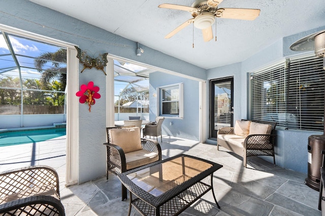 view of patio featuring a lanai and a fenced in pool