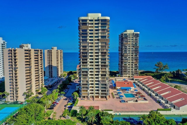 view of building exterior featuring a water view