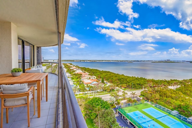 balcony featuring a water view