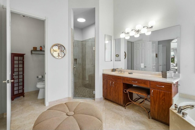 full bathroom with toilet, shower with separate bathtub, tile patterned floors, and vanity