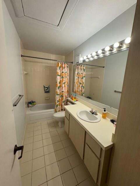 full bathroom featuring vanity, shower / bathtub combination with curtain, tile patterned floors, and toilet