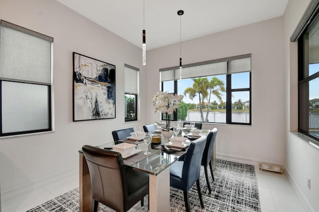 dining room featuring light tile patterned floors