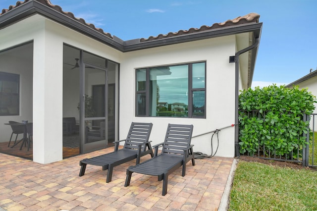 view of patio / terrace with ceiling fan