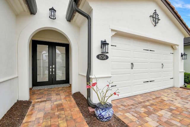 doorway to property featuring french doors