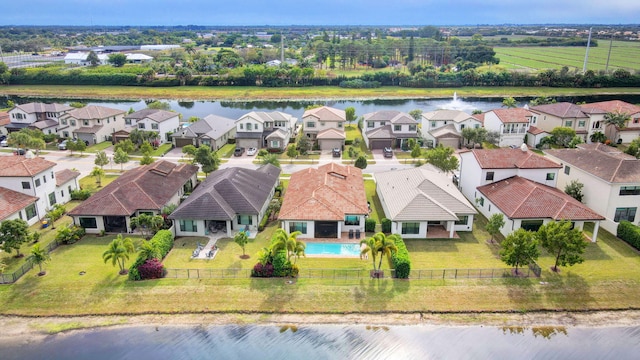 drone / aerial view with a water view