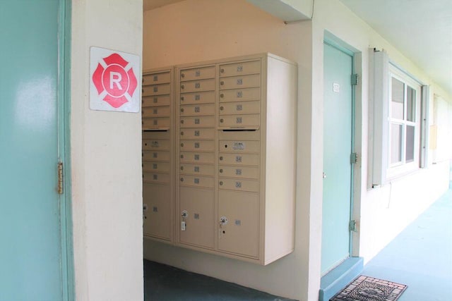 view of home's community featuring mail boxes