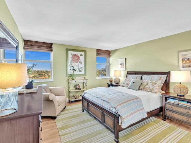 bedroom with light hardwood / wood-style flooring