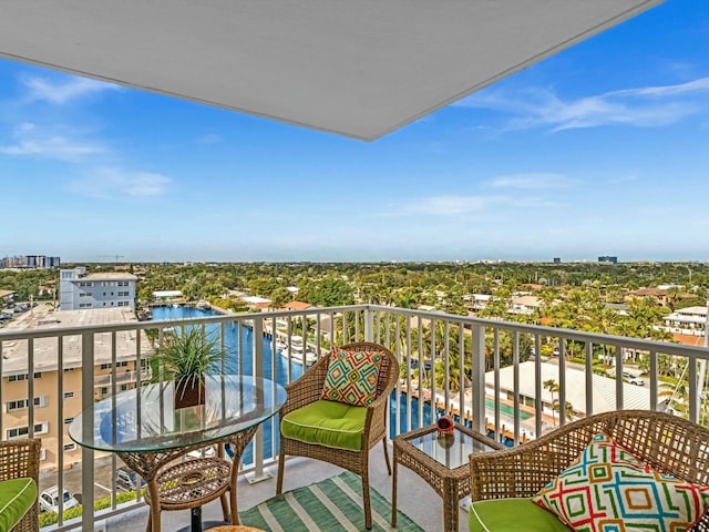 balcony featuring a water view