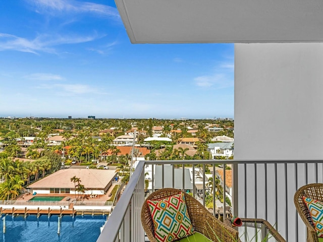 balcony featuring a water view