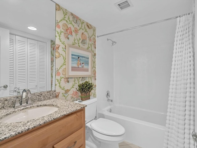 full bathroom with vanity, toilet, and shower / bath combo with shower curtain