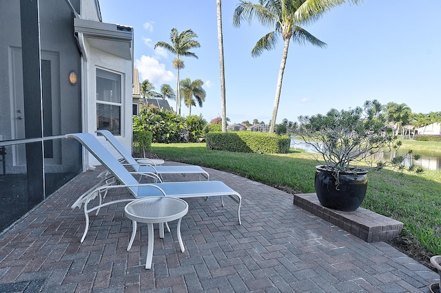 view of patio / terrace featuring a water view