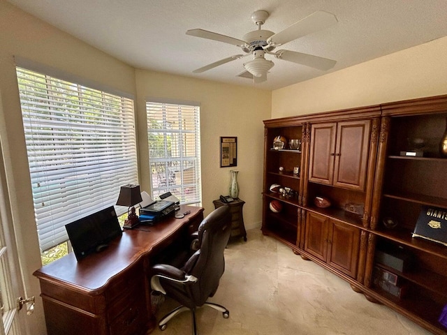 office area with ceiling fan