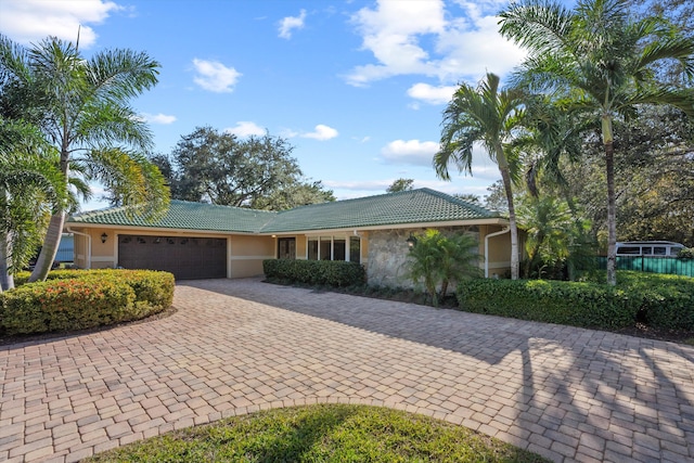 ranch-style home with a garage