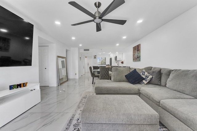 living room with ceiling fan