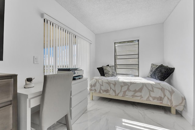 bedroom with a textured ceiling