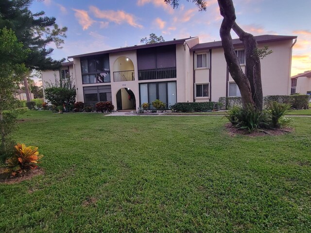 130 Lake Pine Cir Unit C1, Greenacres, FL 33463 - view of outdoor building at dusk