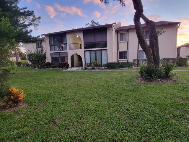 view of outdoor building at dusk