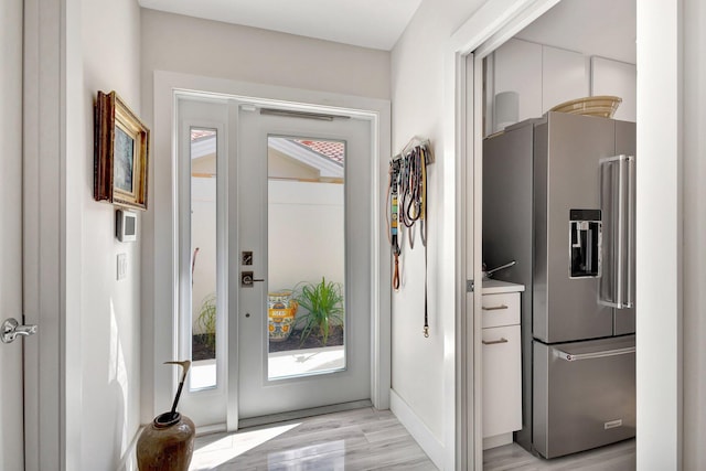 doorway to outside featuring light hardwood / wood-style floors