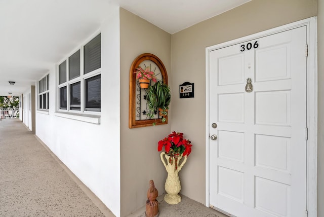 property entrance with covered porch