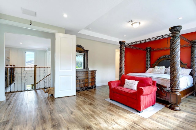 bedroom featuring hardwood / wood-style flooring