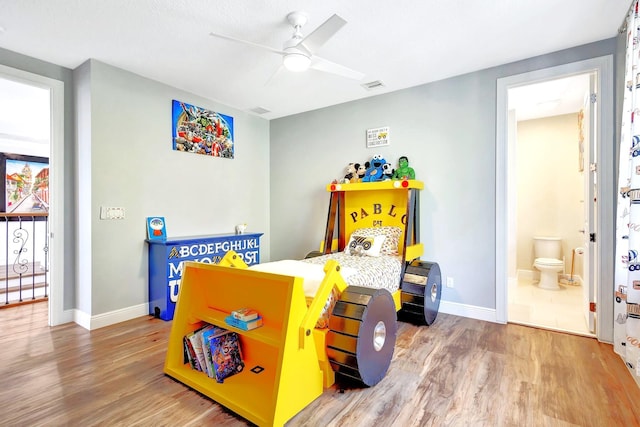 game room with hardwood / wood-style floors and ceiling fan