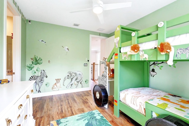 bedroom featuring light hardwood / wood-style floors and ceiling fan