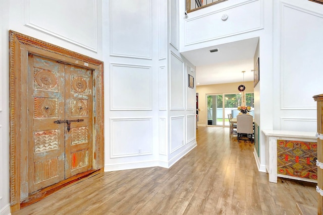 hallway with light wood-type flooring