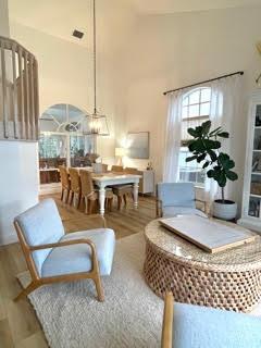 living area with hardwood / wood-style flooring