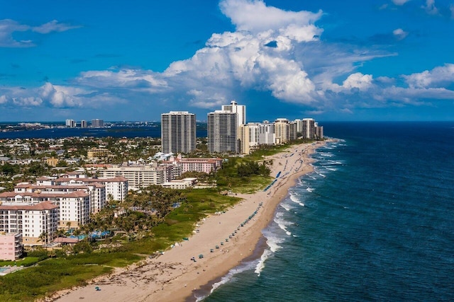 bird's eye view with a beach view and a water view